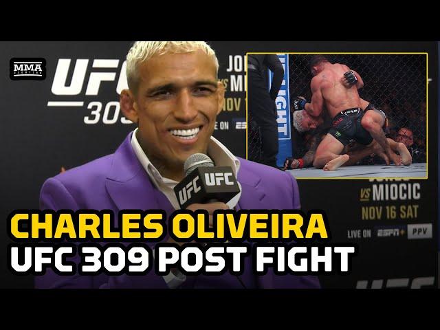 Charles Oliveira Reacts To Michael Chandler’s Repeated Blows To Back Of Head At UFC 309