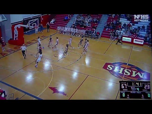 Marquette(MI)'s Jacob MacPhee dunks vs. Escanaba(MI)