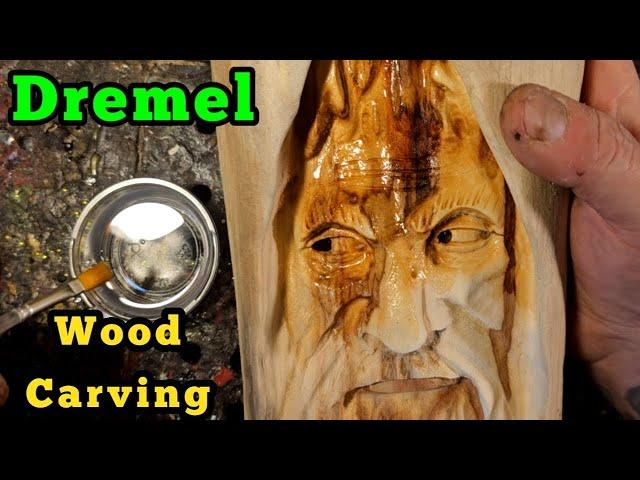 Carving A woodspirit in spalted wood with dremel.