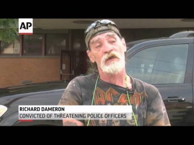 Ohio Man Who Threatened Cops Holds 'Idiot' Sign