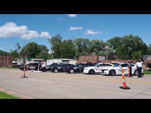 Officer Langsdorf Being Escorted to Funeral Home