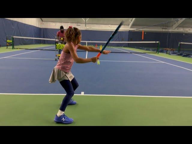 8 Year old Tennis Prodigy                        (hitting forehand )