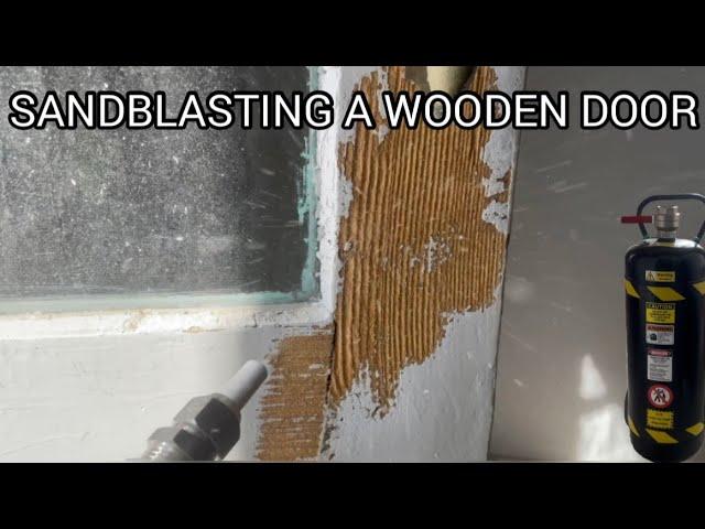 SANDBLASTING A WOODEN DOOR