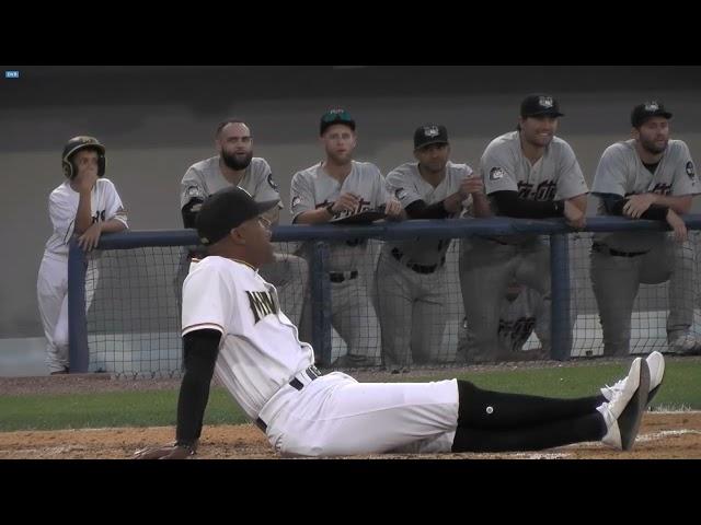 Sussex County Miners Bobby Jones makes home plate dirt angels in protest