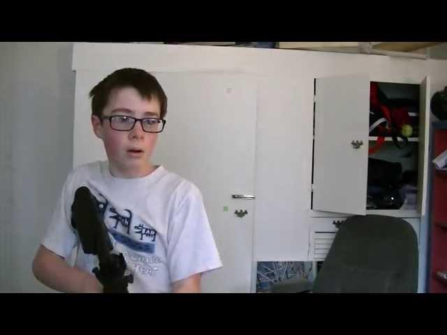 KID SHOOTS SCREEN WITH AIRSOFT GUN