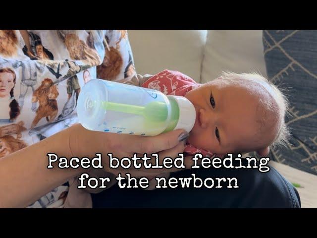 Paced bottle feeding for the newborn in side lying