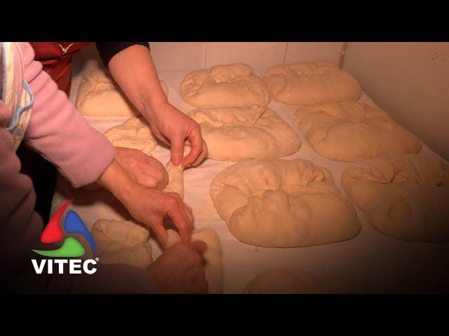 Fazer pão à moda antiga na freguesia da Agualva