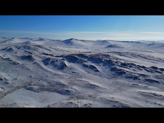 снежные холмы в Прибайкалье и Тажераны