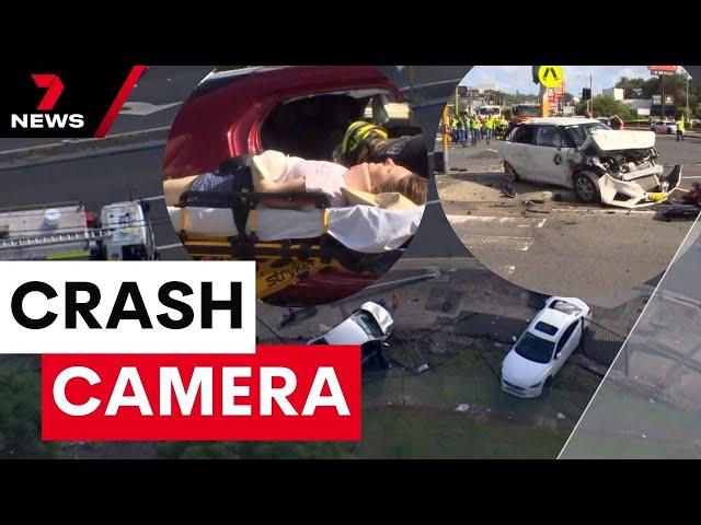 Exclusive footage of a truck crashing into eight cars on one of Sydney's busiest roads | 7NEWS