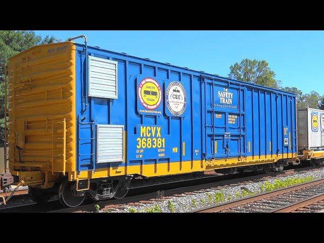 CSX Mixed Freight Train Carrying Safety Training Cars