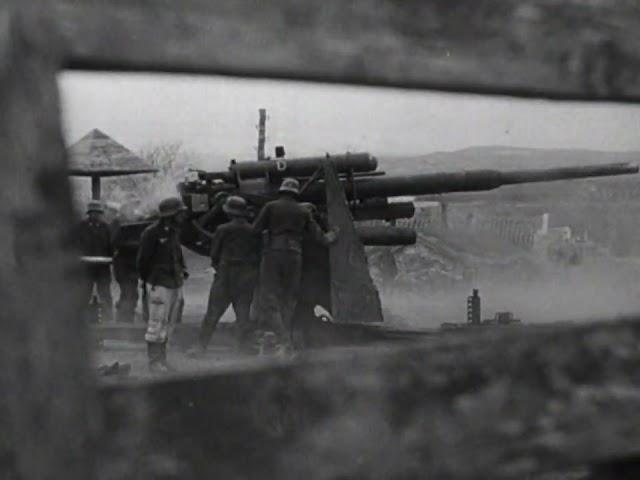 88mm Flak guns engage Soviet targets on land and at sea on the Kerch Peninsula in May 1942