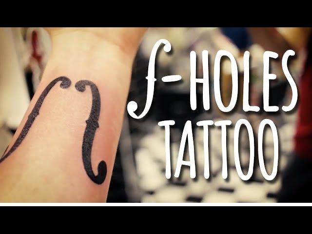 Violin f-holes tattoo