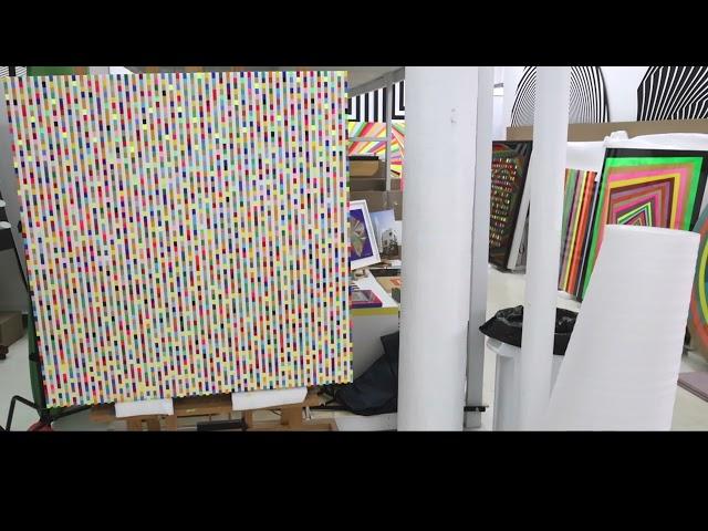 Ron Agam in his studio painting during the pandemic