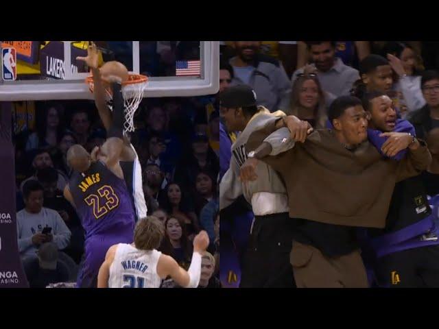 LeBron James INSANE poster dunk on Jonathan Isaac has Lakers bench going crazy