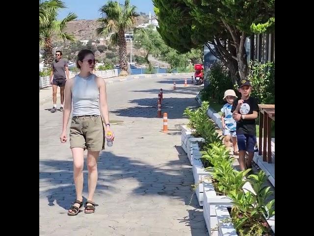 Rustem Yermekbayev and Zulfira Tazetdinova and kids walking around Bodrum.