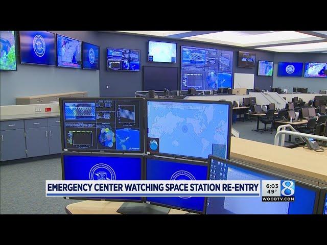 Emergency center watching space station re-entry