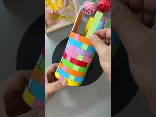 Use colorful cardboard strips and children to weave beautiful pen holders. Beautiful and practic