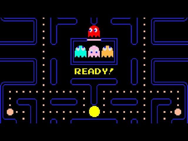 playing Pac-Man handheld device in 2024