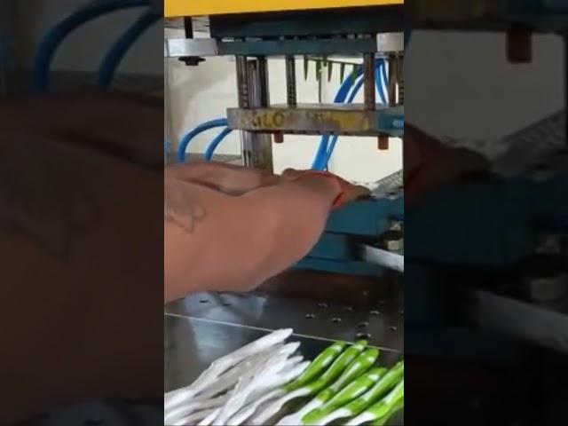 Tooth brush making machine