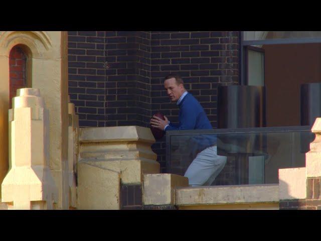 Peyton Manning Throws a Football Off Skyscraper