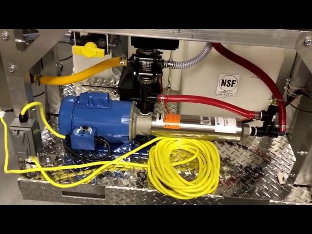 Booster pump skid with pro portioner and control wizard remote control system