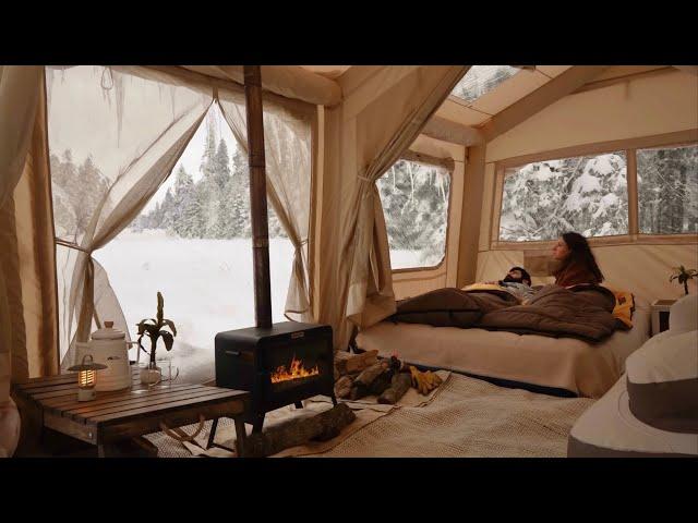 HOT TENT CAMP WITH STOVE IN HEAVY SNOW