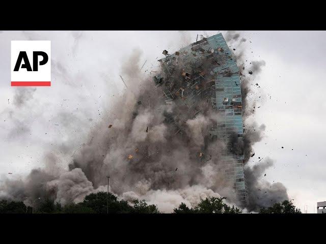 A hurricane-damaged skyscraper is imploded in Louisiana