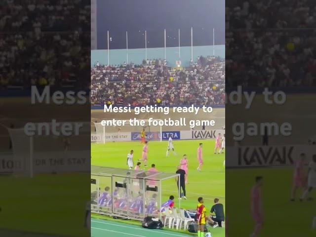 Messi getting ready to enter the football game in Jamaica