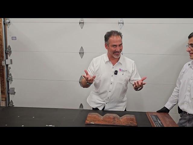 Hefting a copper ingot at the A.E. Seaman Mineral Museum in Houghton, Michigan