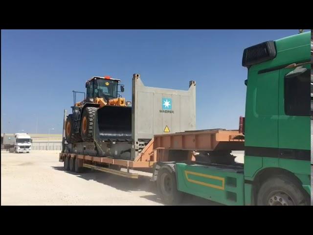 Construction equipment on Flat Rack