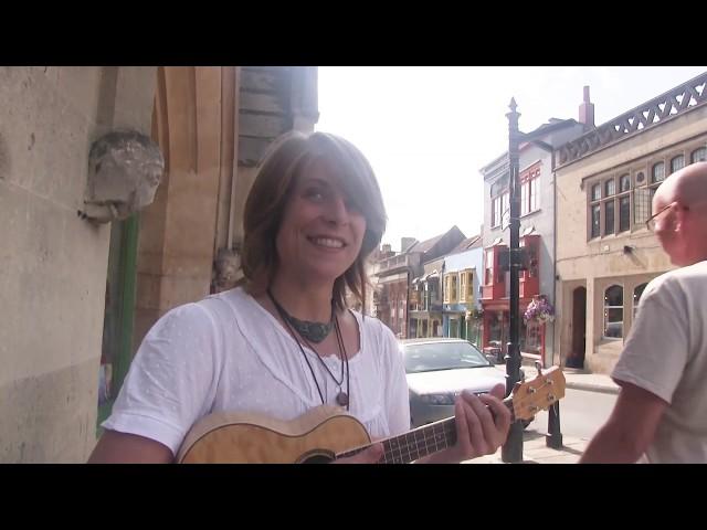 Avalon Pleiades performing in Glastonbury High Street