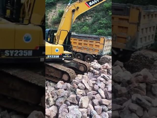 397 Excavator And Dump Trucks Working