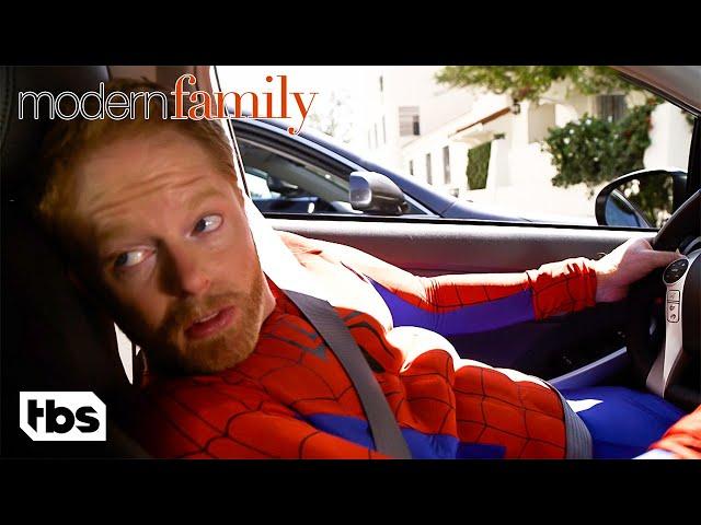 Mitchell Hides His Spider-Man Halloween Costume Under His Suit (Clip) | Modern Family | TBS