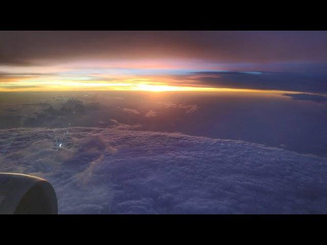 Looking Out The Airplane Window Seat | cloudy sunset |