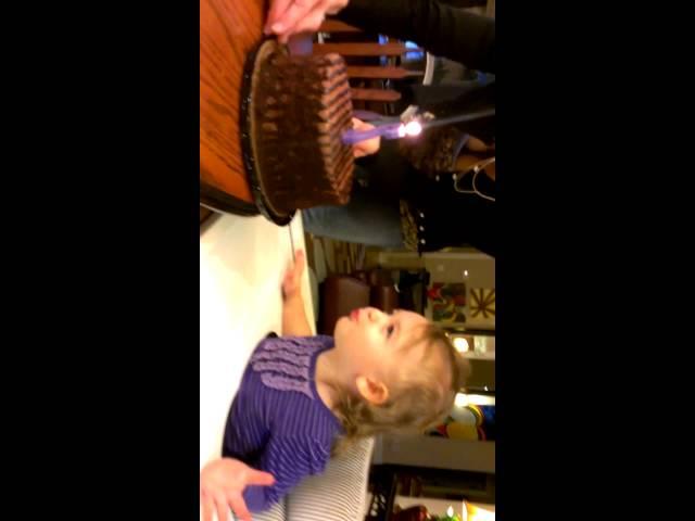 It's hard to blow out candles when you're two!