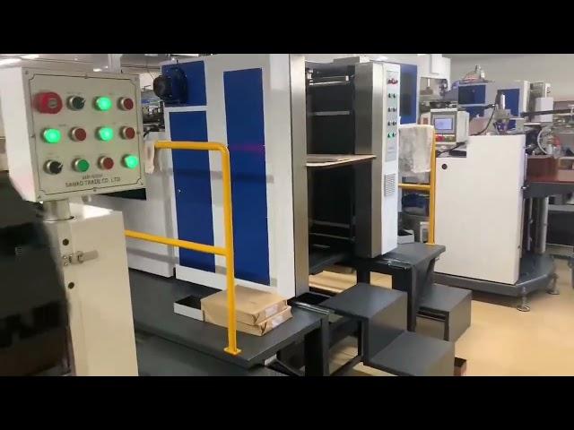 Fully automatic rigid box making machine running at customer's factory in Japan