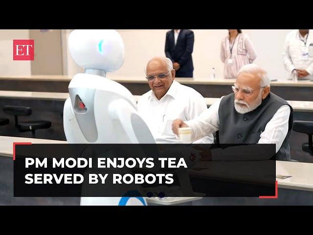 Gujarat: PM Modi enjoys cup of tea served by the robots at Science City, Ahmedabad