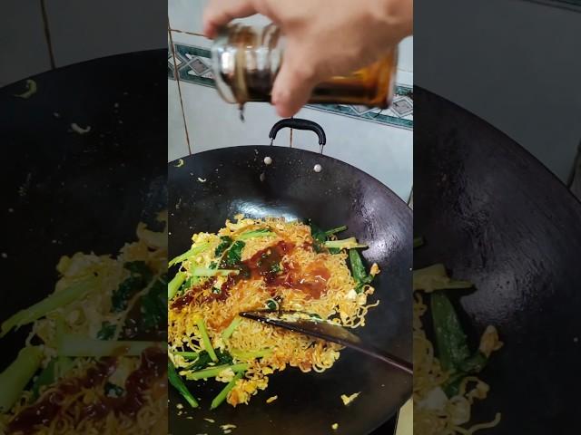 播电话回来向爸爸点Maggie goreng