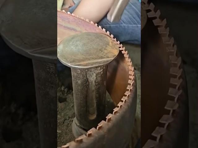 The craftsman is using tools to modify the edging of copper products#shorts #tools