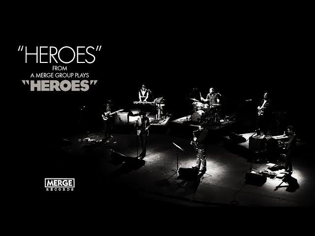 A Merge Group plays "Heroes"