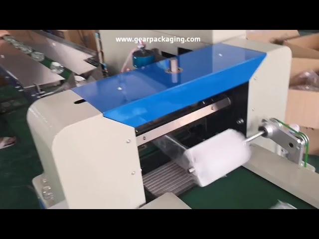 Empty shampoo plastic bottle manual loading bag film wrapping sealing packing machine