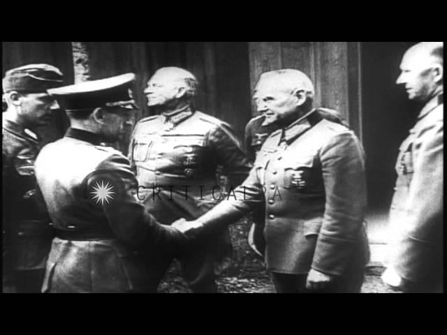 German Generals meet with Hitler at forest headquarters cabin (Wolf's Lair) near ...HD Stock Footage