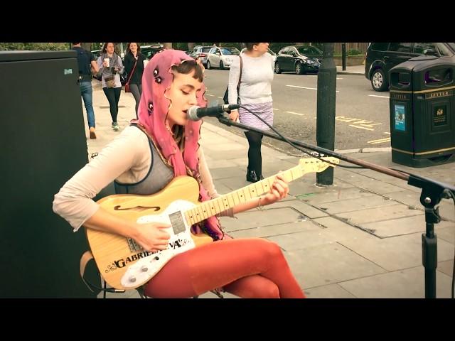 Guitar Street Performers Gabriela Eva Playing Live Music