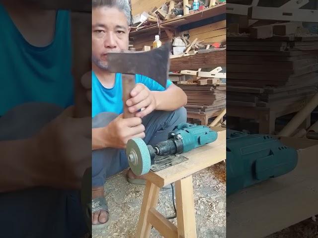Sharpening an axe with homemade grinding tool