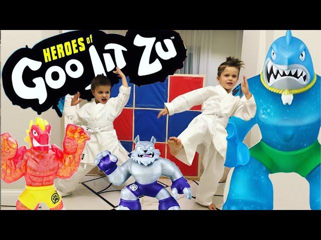 Children and new toys in  cartoon characters Heroes of Goo Jit Zu