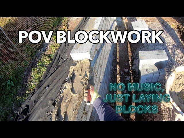 POV concrete block laying