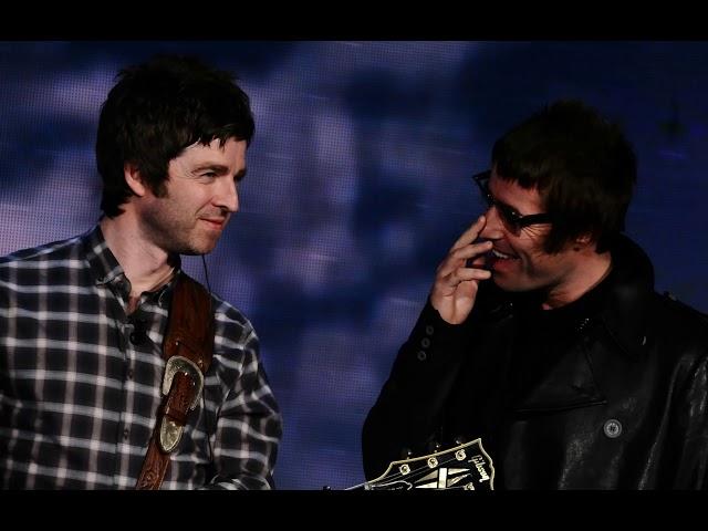 Noel and Liam Gallagher, the fork and the bottle of champagne