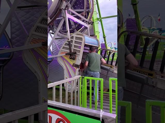 I am riding the ZIPPER at the county fair.