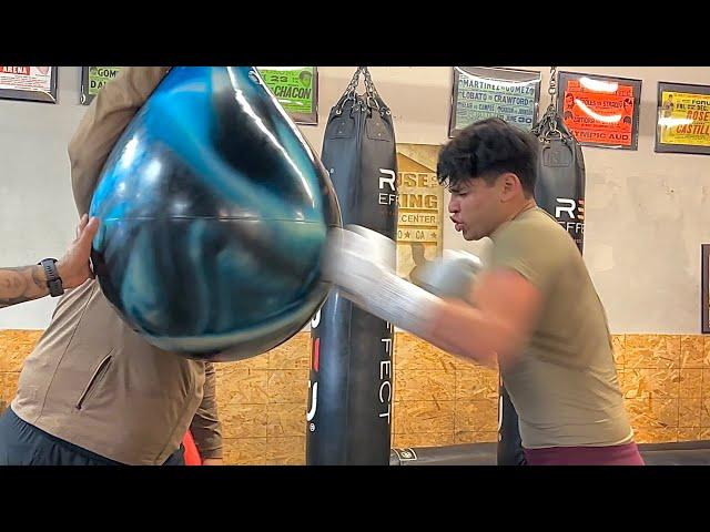 RYAN GARCIA TRAINING FOR ROLLY ROMERO DESTROYS THE HEAVY BAG WITH EDDY REYNOSO