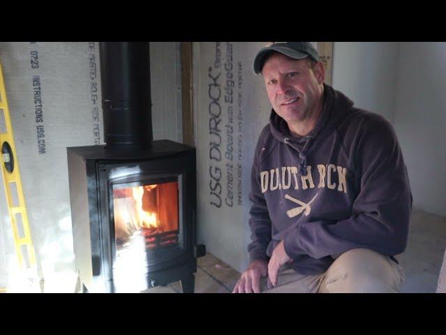 Installing a wood stove in my off grid tiny cabin bunkhuse.